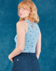 Angled back view of Star Cropped Tank on Margaret