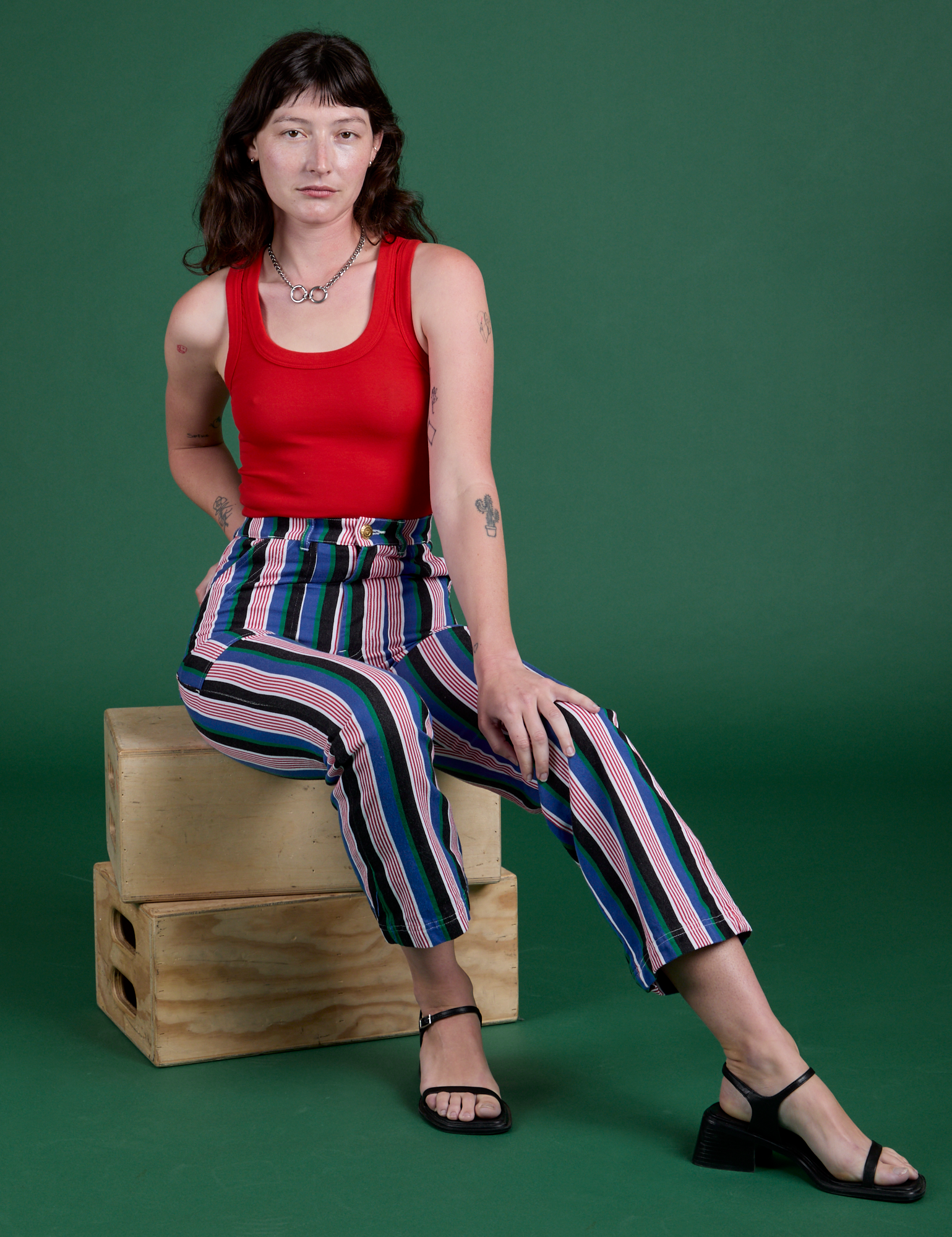 Work Pants in Pacific Stripe and mustang red Tank Top on Alex