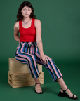 Work Pants in Pacific Stripe and mustang red Tank Top on Alex