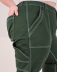 Carpenter Jeans in Swamp Green side close up on Ashley