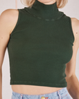 Sleeveless Essential Turtleneck in Swamp Green front close up on Madeline