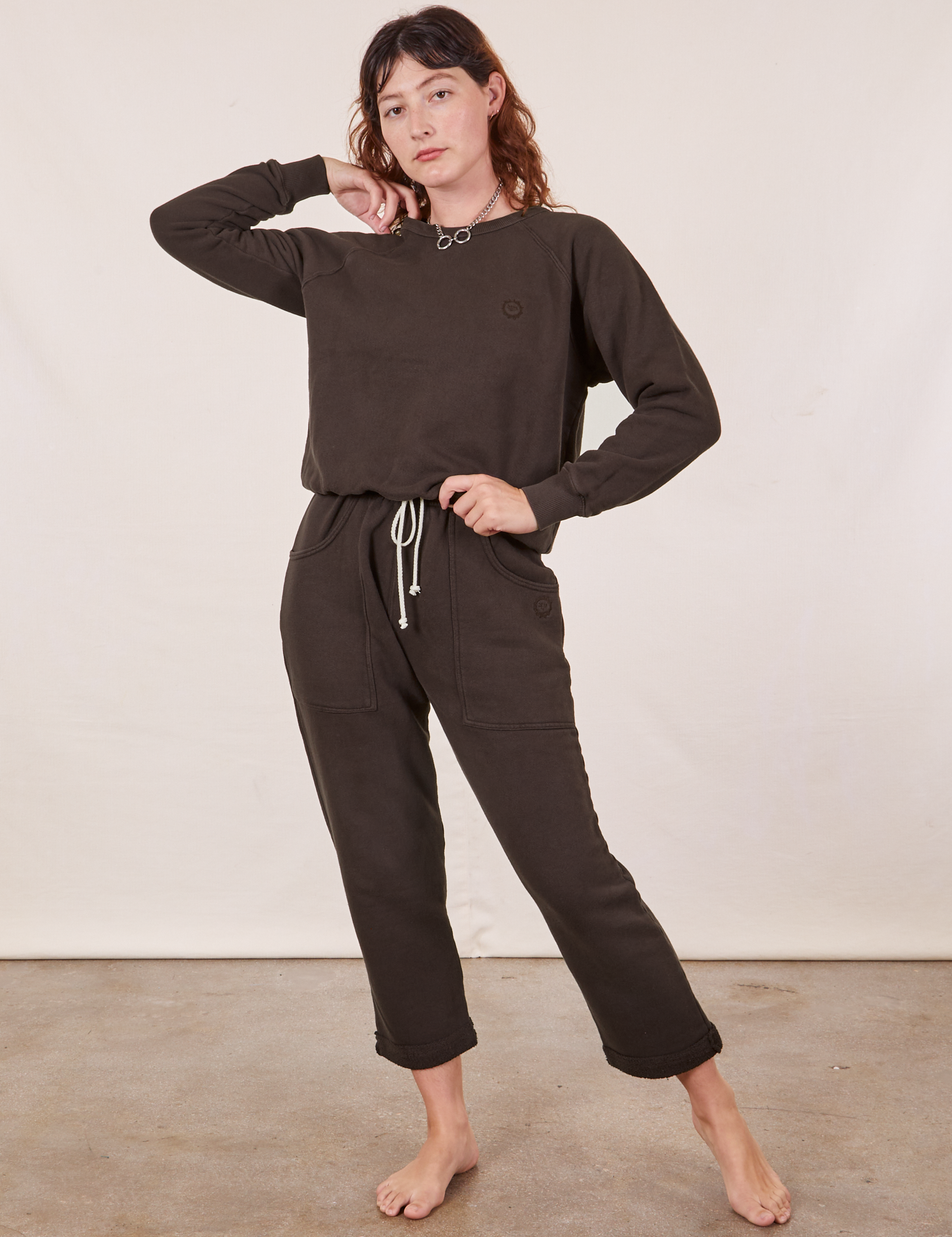 Alex is wearing Heavyweight Crew in Espresso Brown and matching Cropped Rolled Cuff Sweatpants