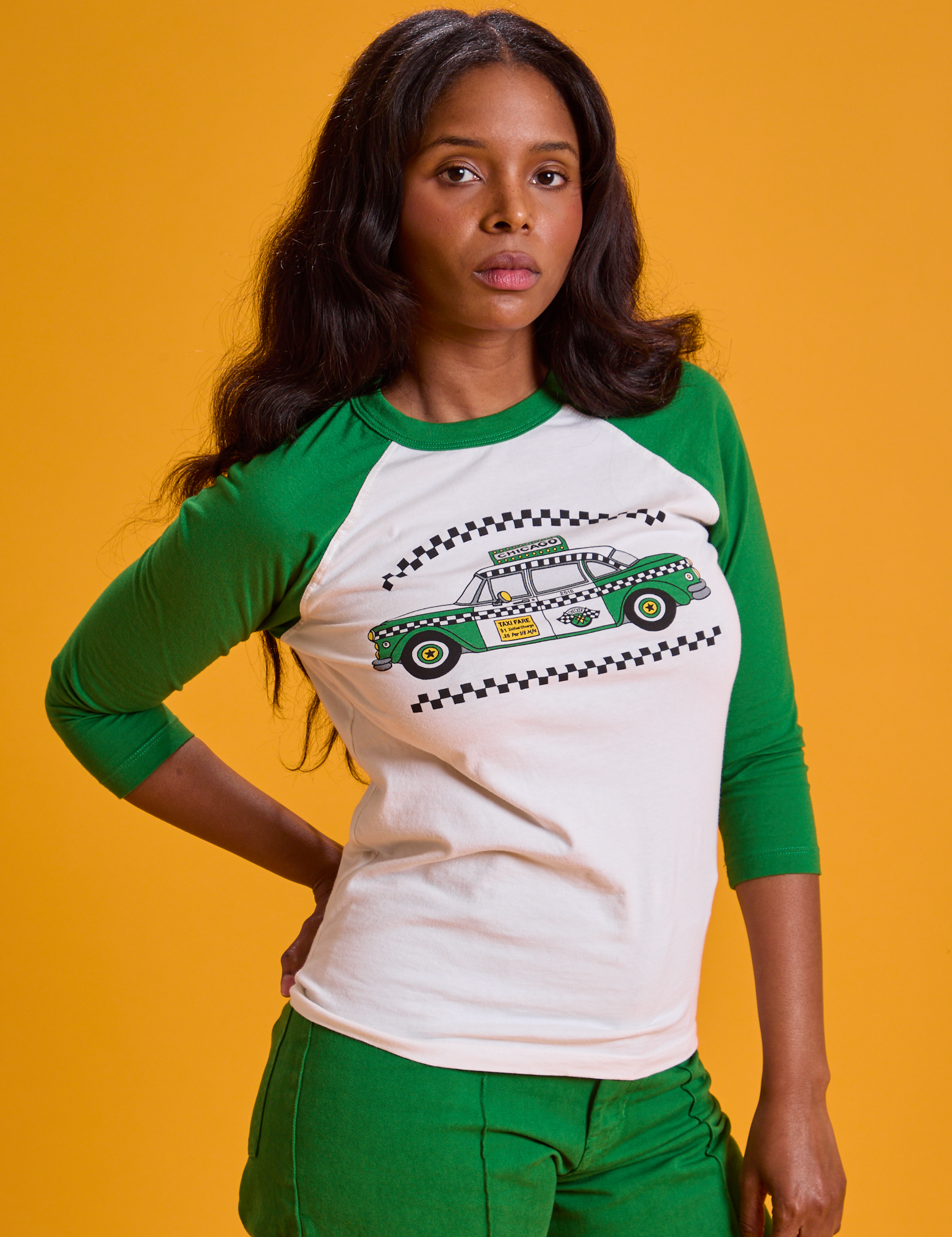 Taxi Raglan Tee in Chicago front close up on Kandia