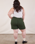 Back view of Trouser Shorts in Swamp Green and Cropped Tank in Vintage Tee Off-White on Ashley