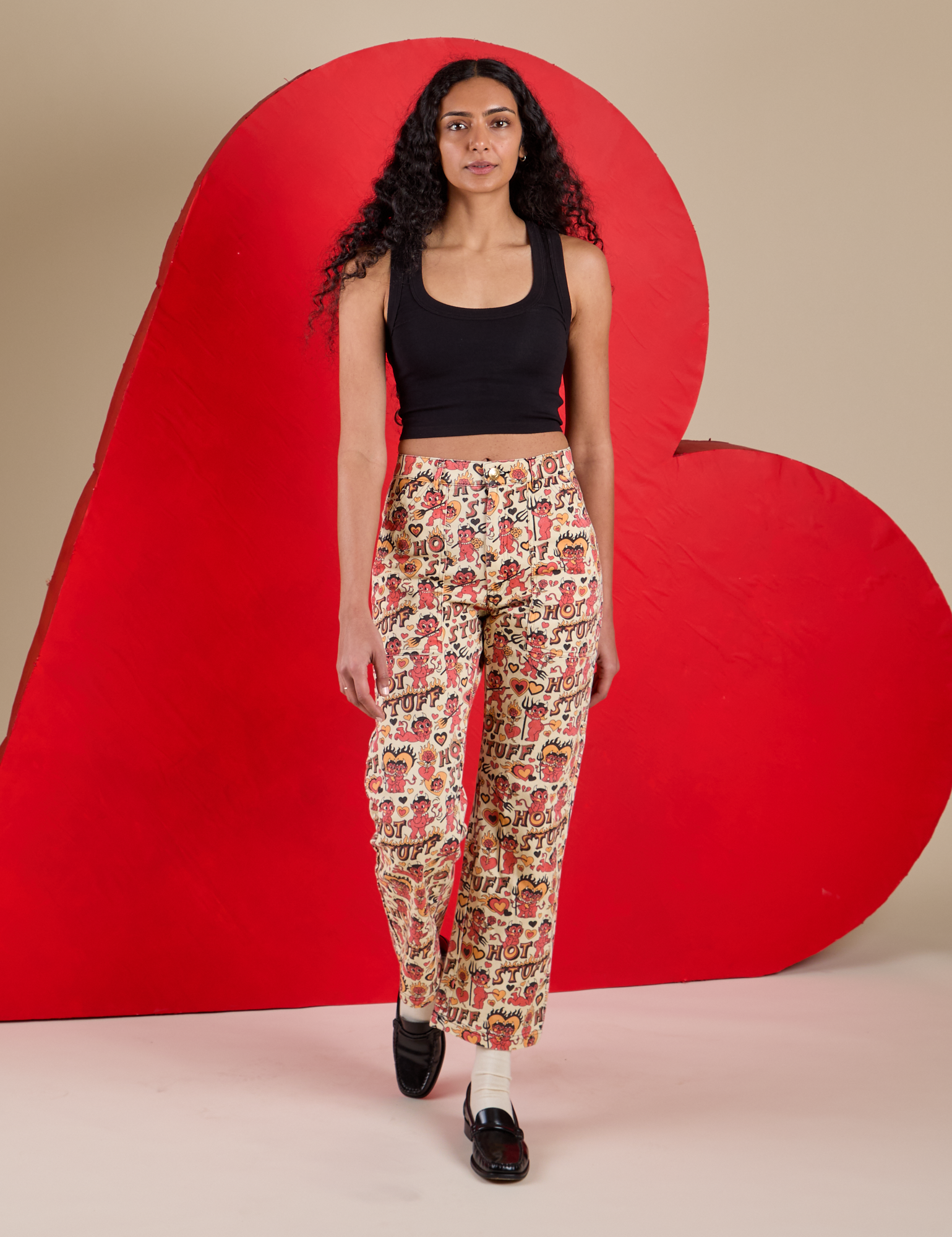 Work Pants in Hot Stuff Print  and black Cropped Tank on Shahana