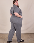 Angled back view of Short Sleeve Jumpsuit in Washed Grey on Marielena