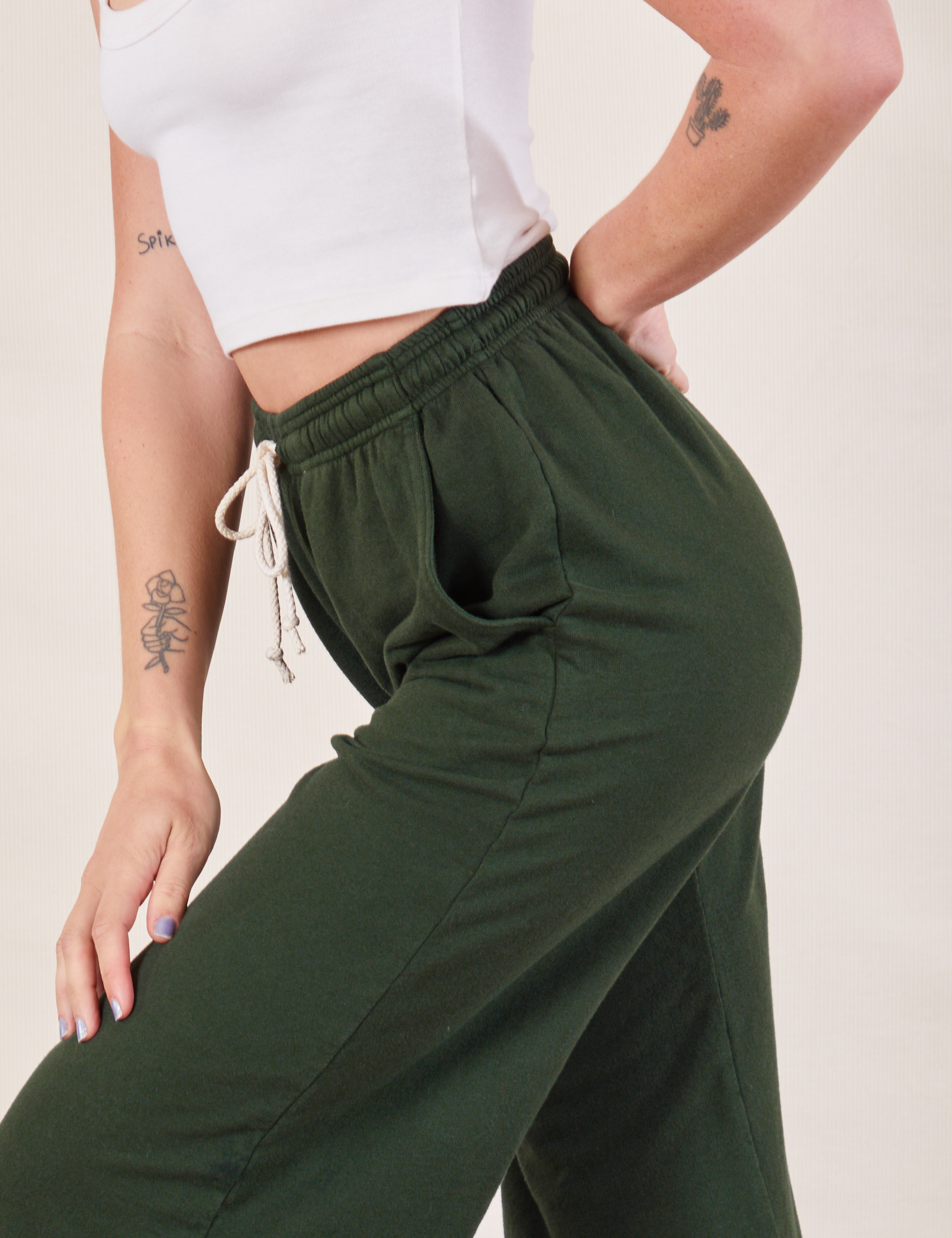 Wide Leg Sweat Pants in Swamp Green side close up on Alex