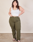 Ashley is 5'7" and wearing 1XL Work Pants in Surplus Green paired with Cropped Tank in vintage tee off-white