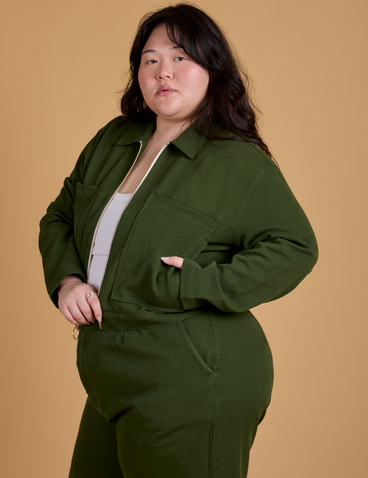 Angled front view of Heritage Mechanic Jacket in Evergreen on Ashley