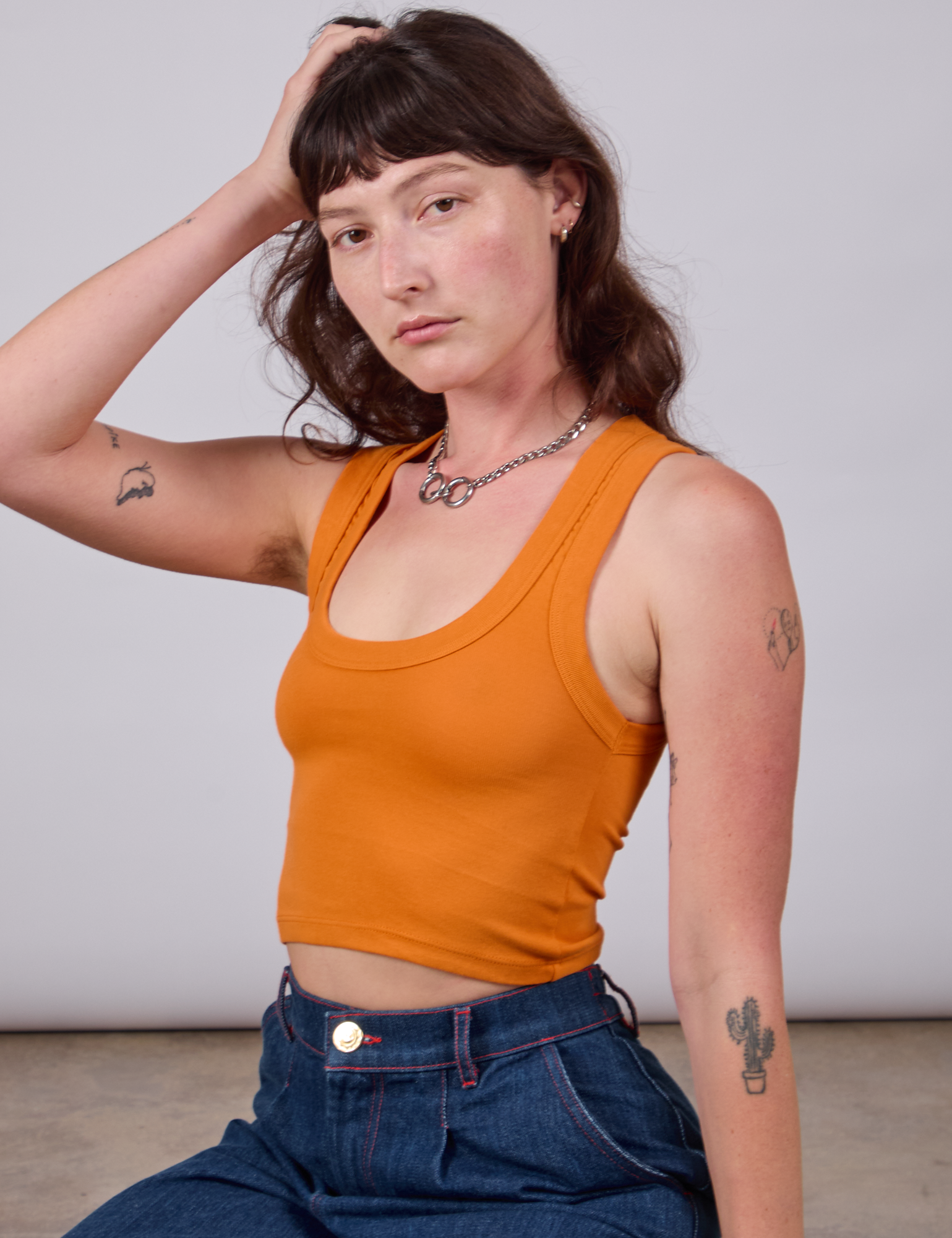 Cropped Tank Top in Creamsicle Orange worn by Alex
