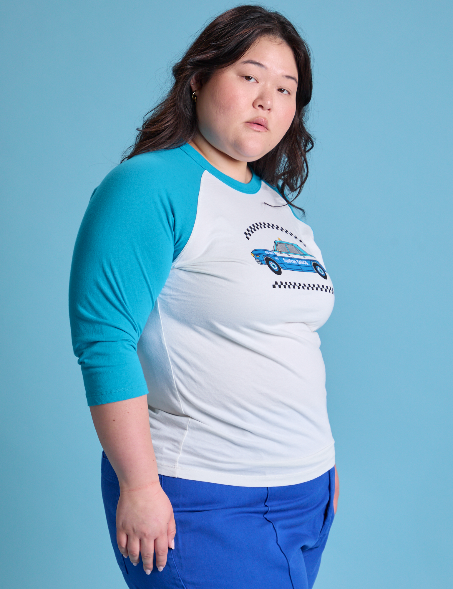 Taxi Raglan Tee in San Francisco side view on Ashley