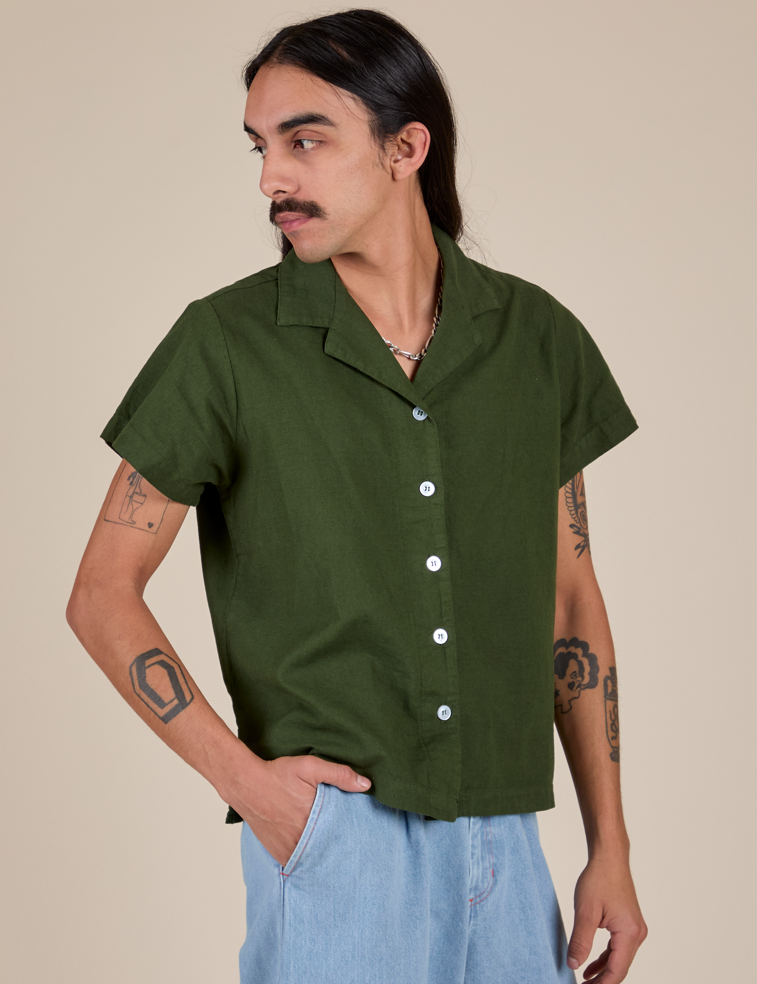 Angled front view of Pantry Button-Up in Evergreen on Anthony