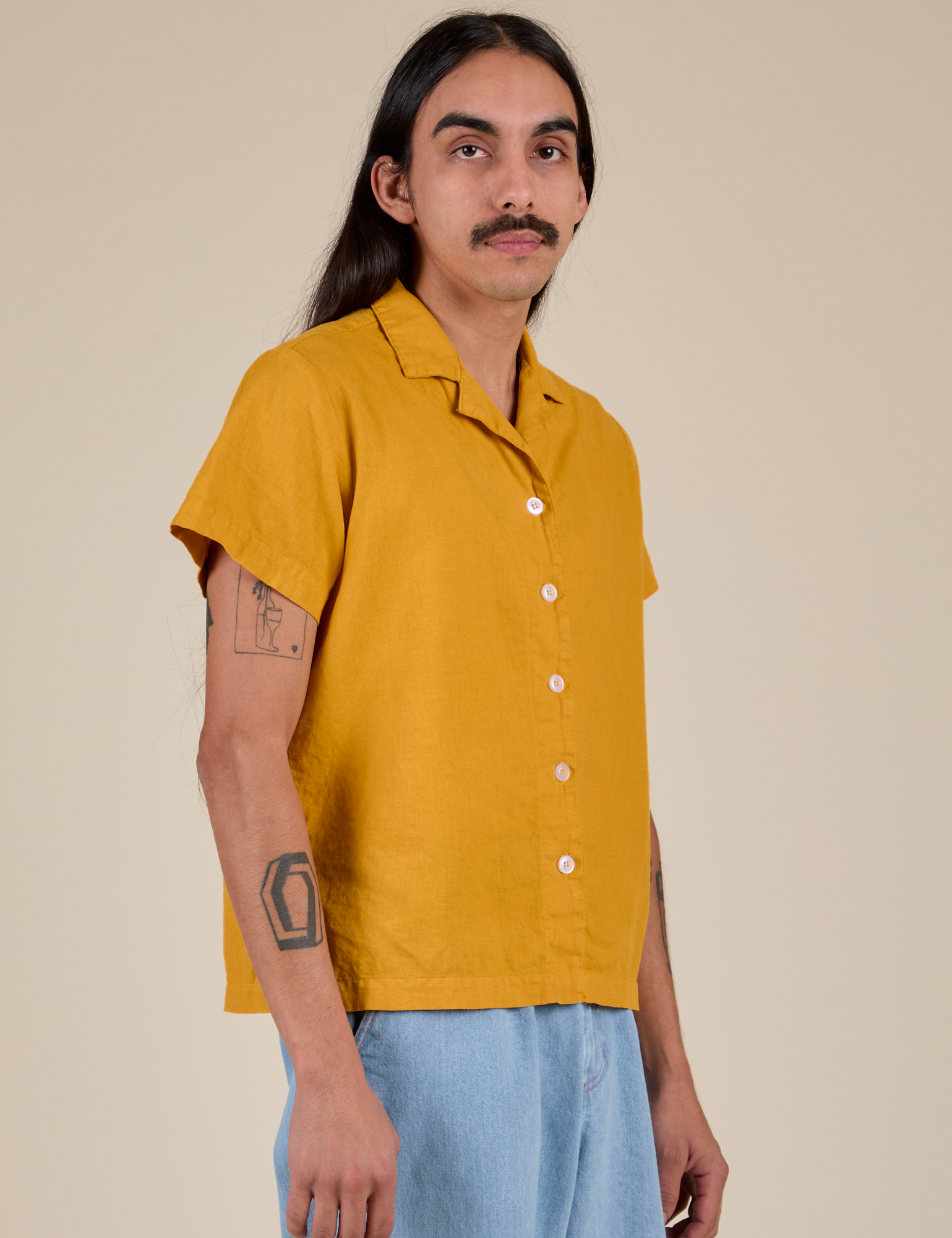 Pantry Button-Up in Mustard Yellow angled front view on Anthony