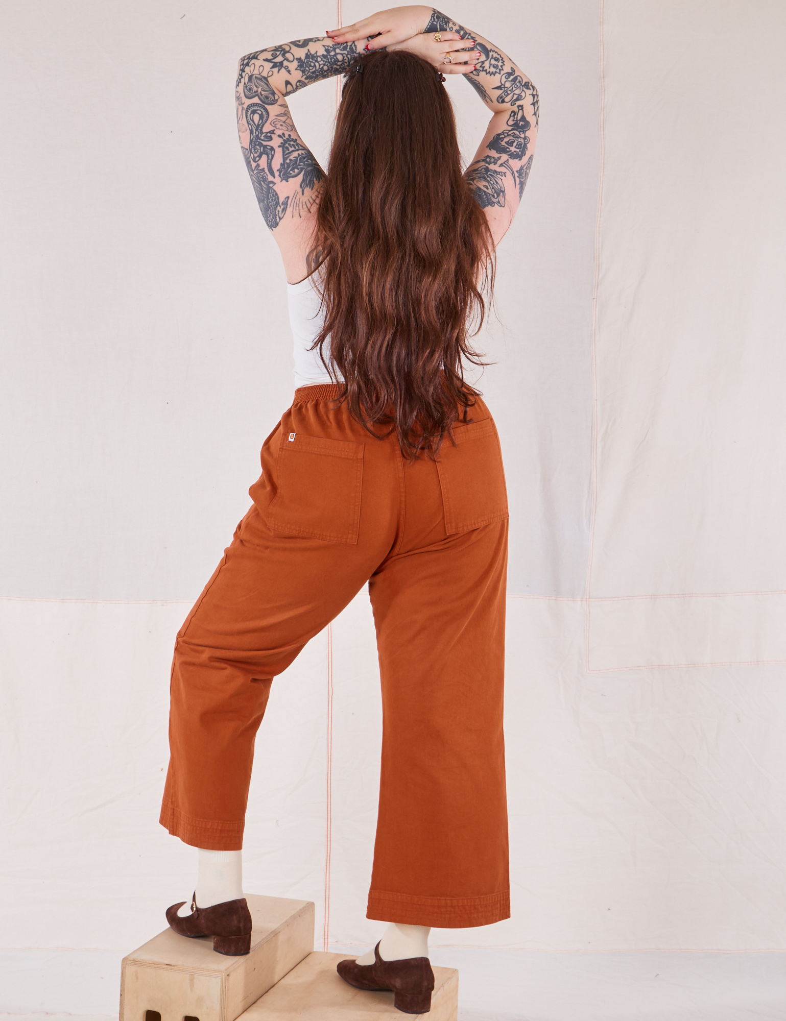 Action Pants in Burnt Terracotta back view on Sydney