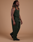 Side view of Action Pants in Swamp Green and Tank Top in Swamp Green on Demi