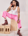 Jesse is wearing Action Pants in Bubblegum Pink and Cropped Tank in vintage tee off-white