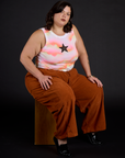 Kristen wearing the Black Star Airbrush Muscle Tee with Burnt Terracotta Corduroy Drop Pocket Cargo Pant