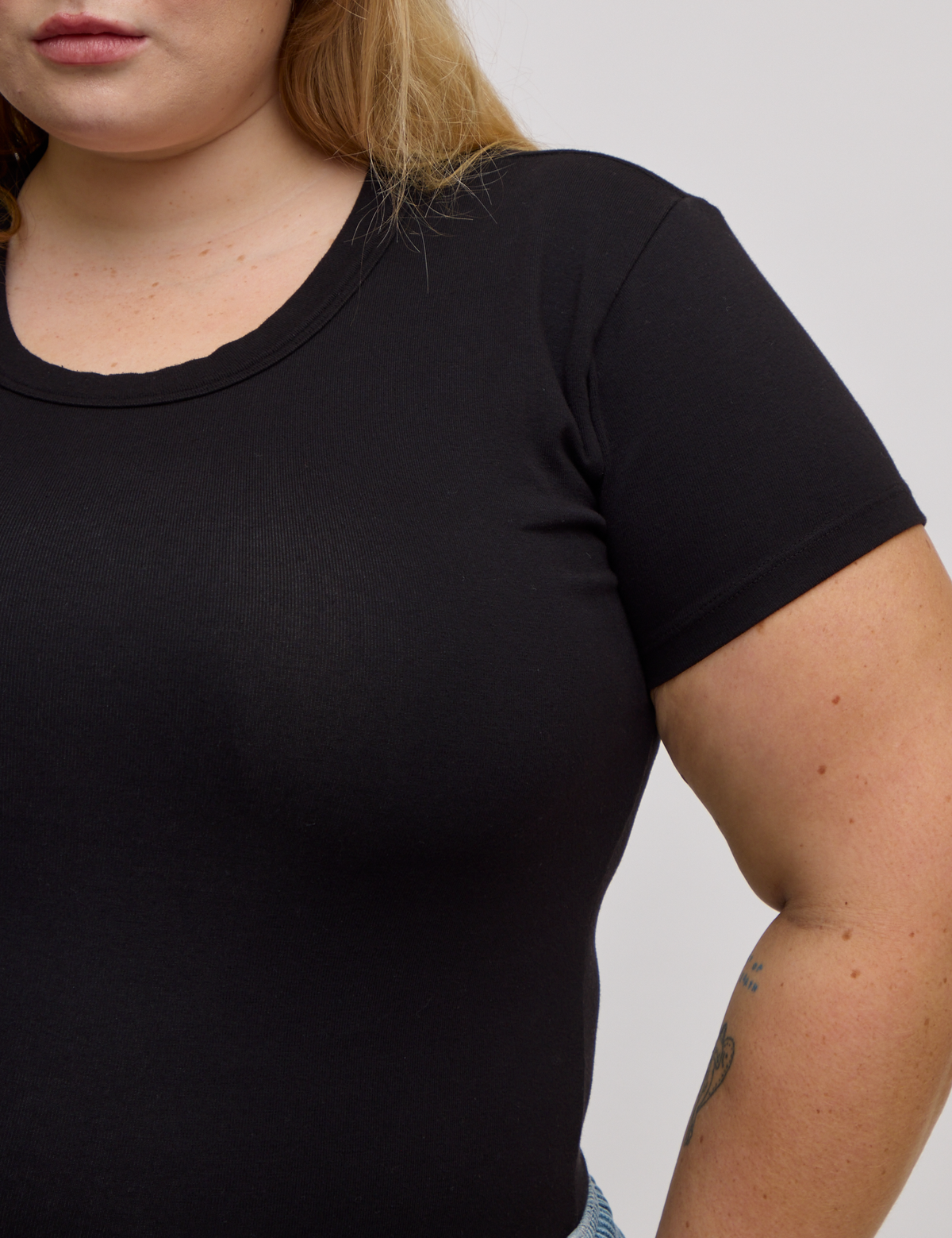 Front close up of Baby Tee in Basic Black on Juliet