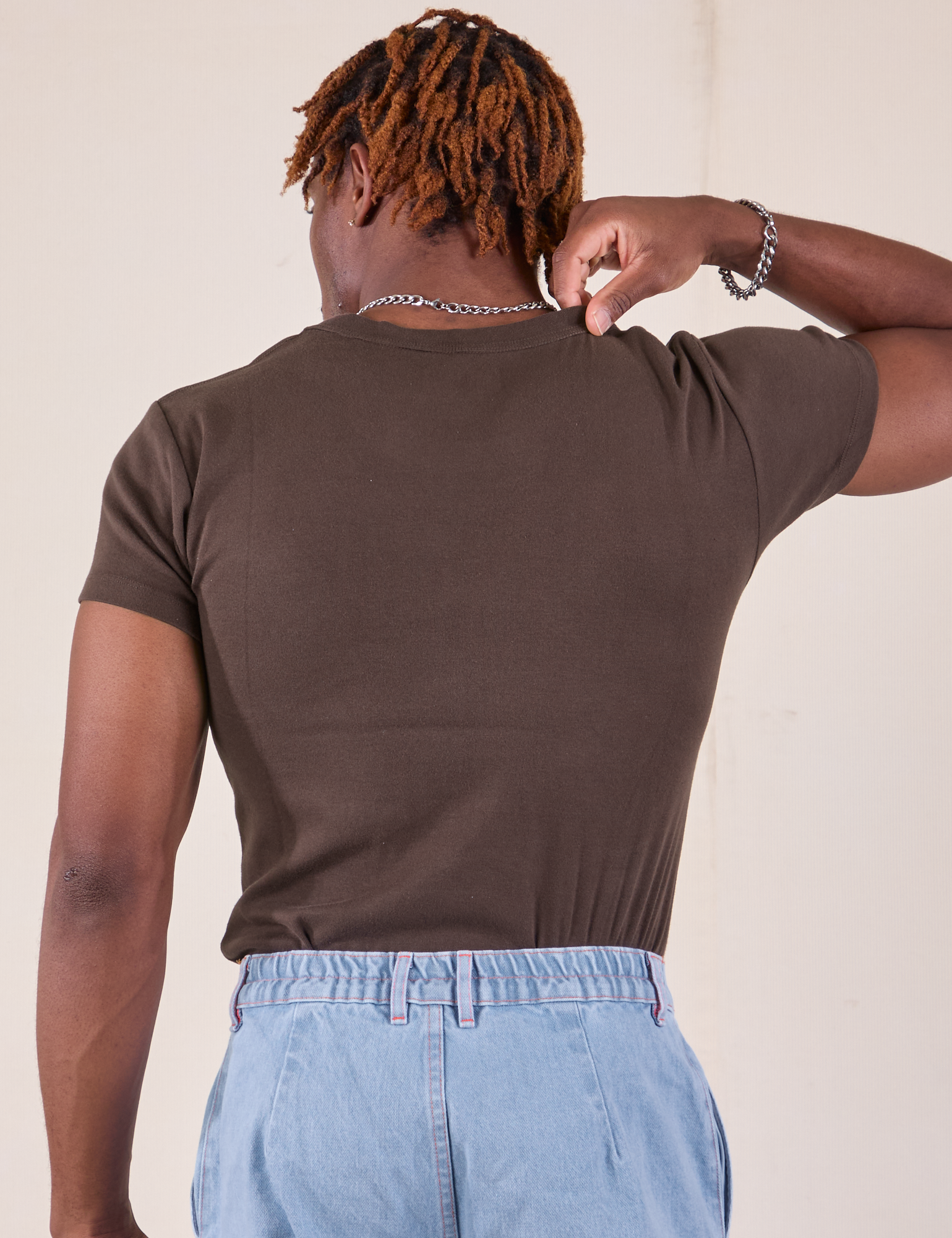 Baby Tee in Espresso Brown back view on Isaac