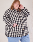 Angled front view of buttoned up Big Gingham Field Coat on Catie