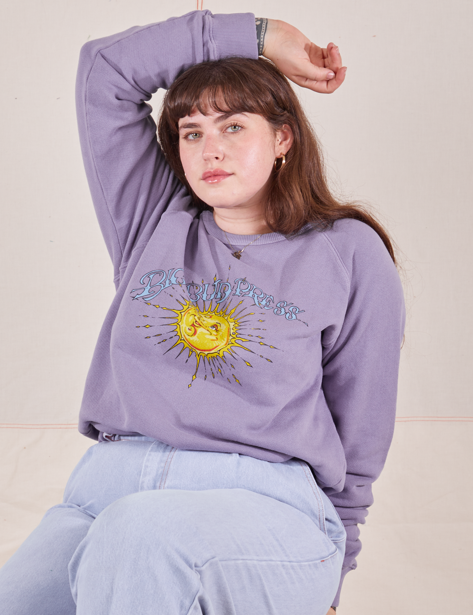 Sydney is 5&#39;9&quot; and wearing XS Bill Ogden&#39;s Sun Baby Crew in Faded Grape