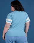 Painted Burly Tee in Baby Blue back view on Ashley