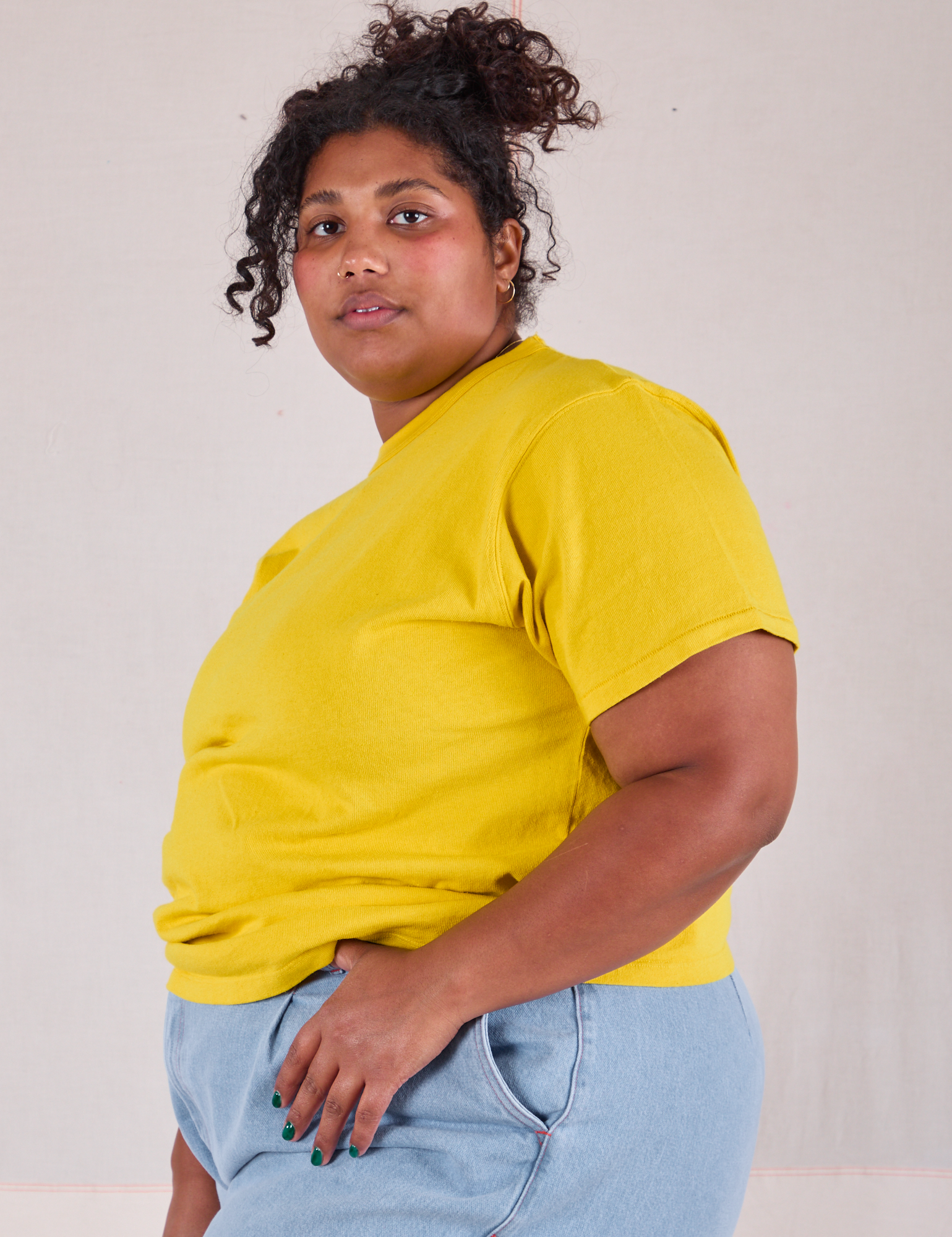 Burly Tee in Golden Yellow side view on Morgan