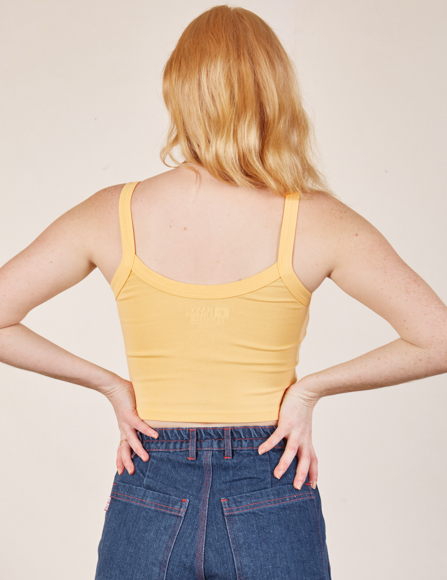 Cropped Cami in Butter Yellow back view on Margaret