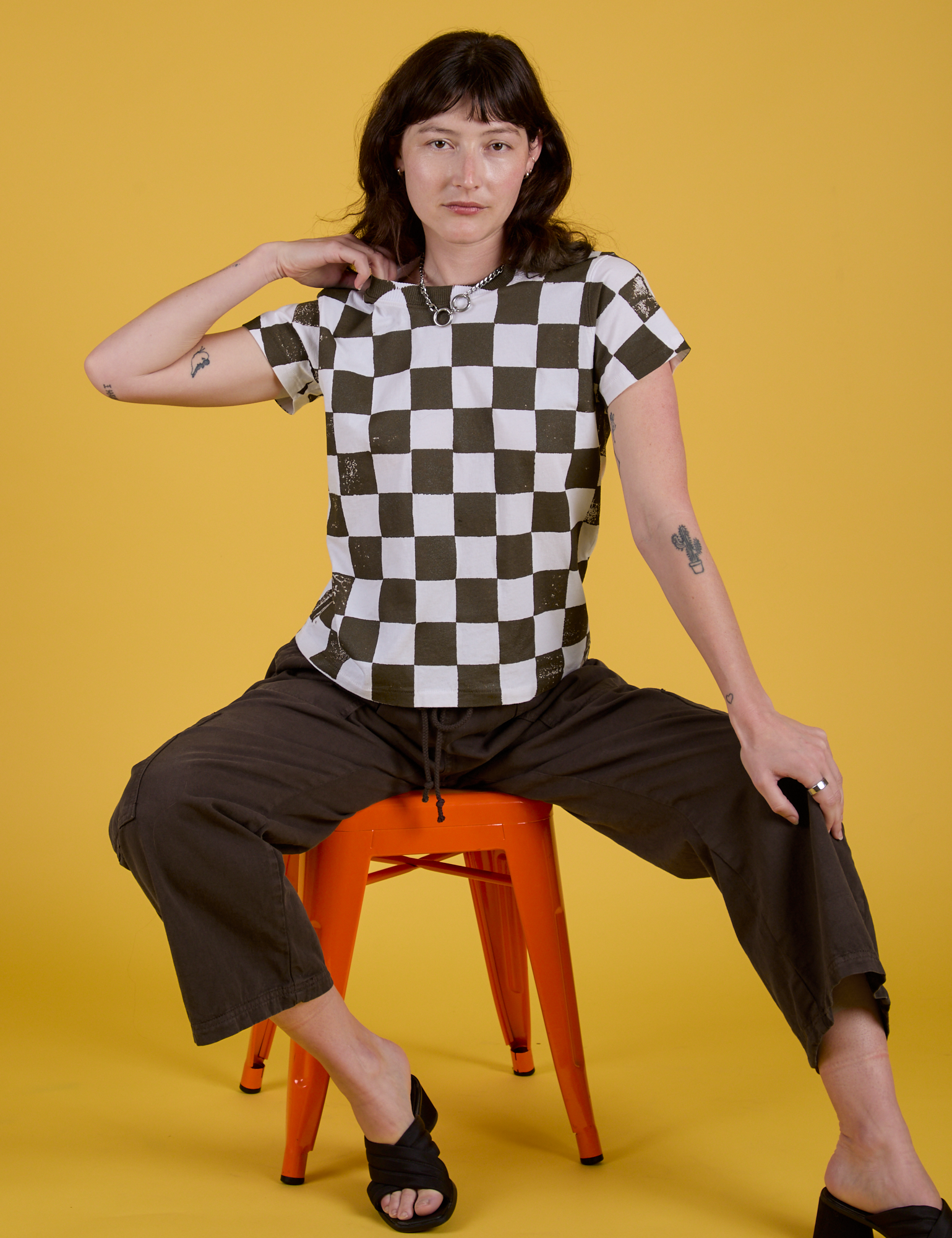 Checker Organic Tee in Espresso Brown and Drop Pocket Cargo Pants worn by Alex
