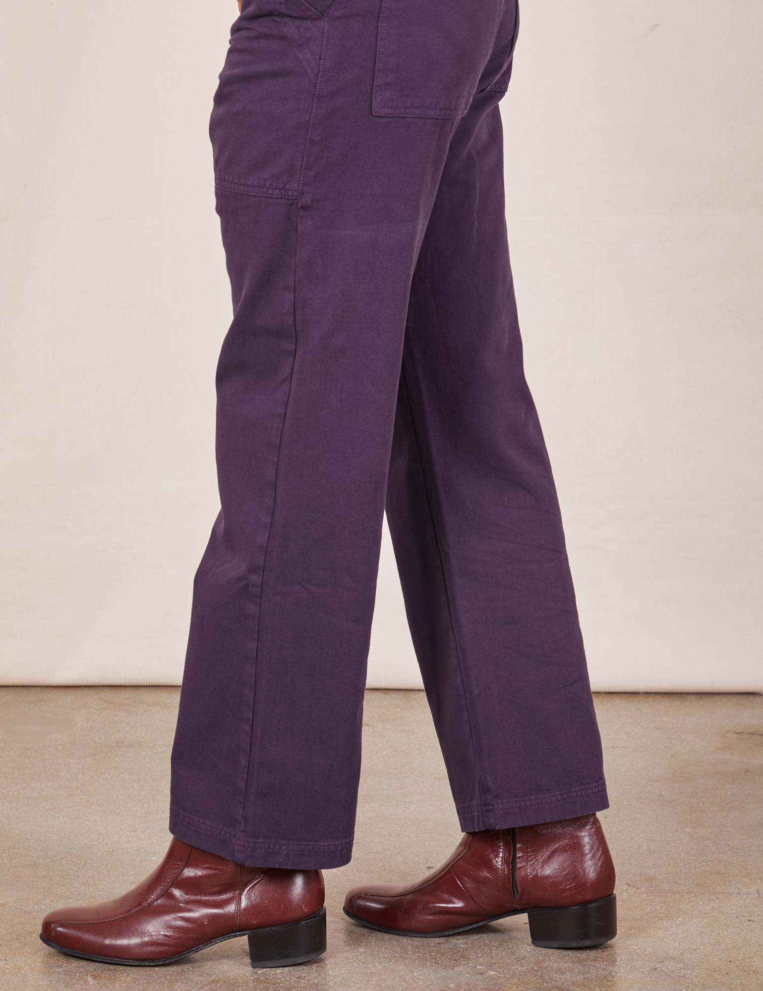 Side view pant leg close up of Work Pants in Nebula Purple worn by Jesse