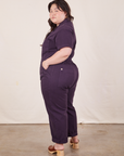 Side view of Short Sleeve Jumpsuit in Nebula Purple worn by Ashley.