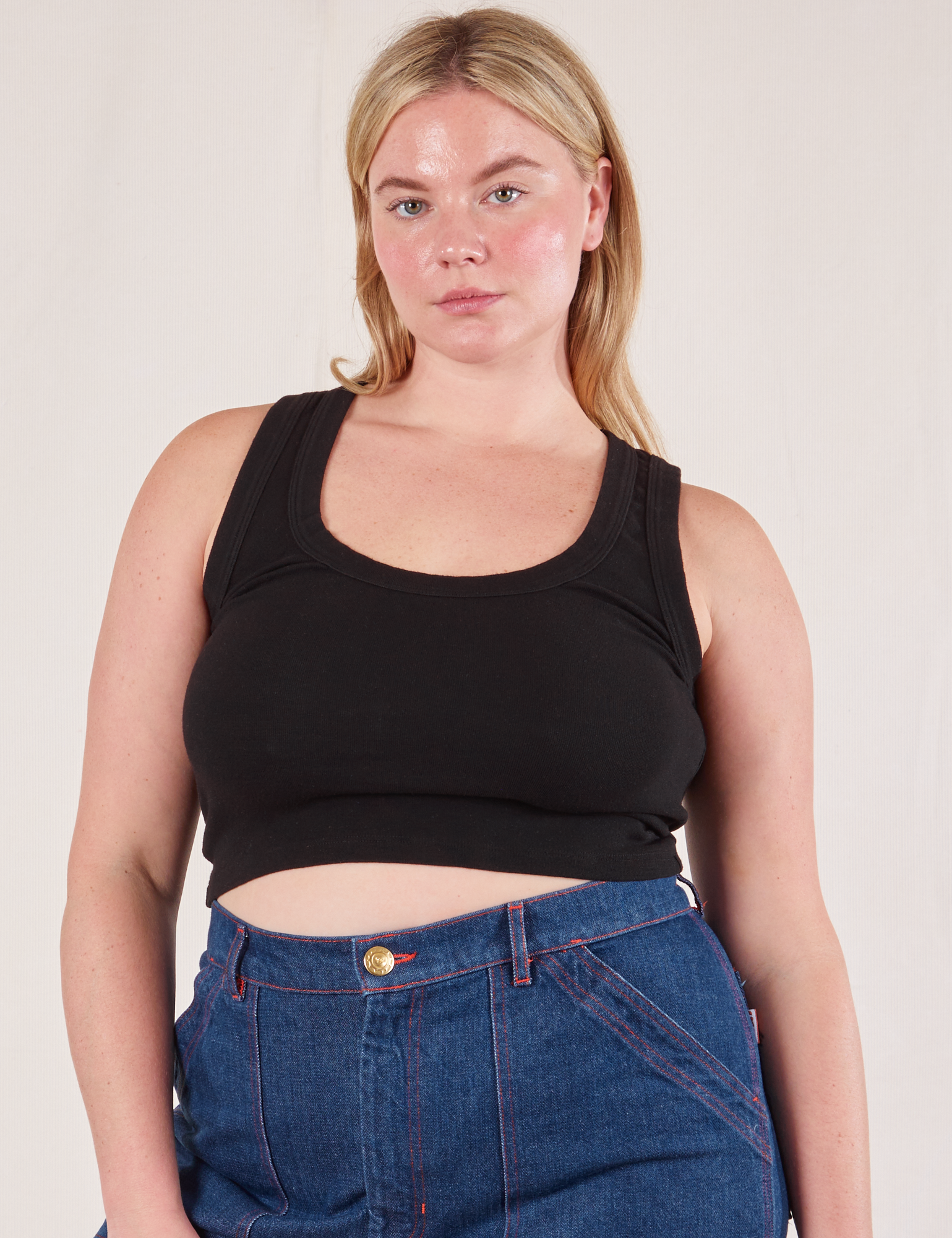 Lish is 5&#39;8&quot; and wearing S Cropped Tank Top in Basic Black