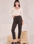 Alex is wearing Easy Pants in Espresso Brown and vintage tee off-white Long Sleeve V-Neck Tee