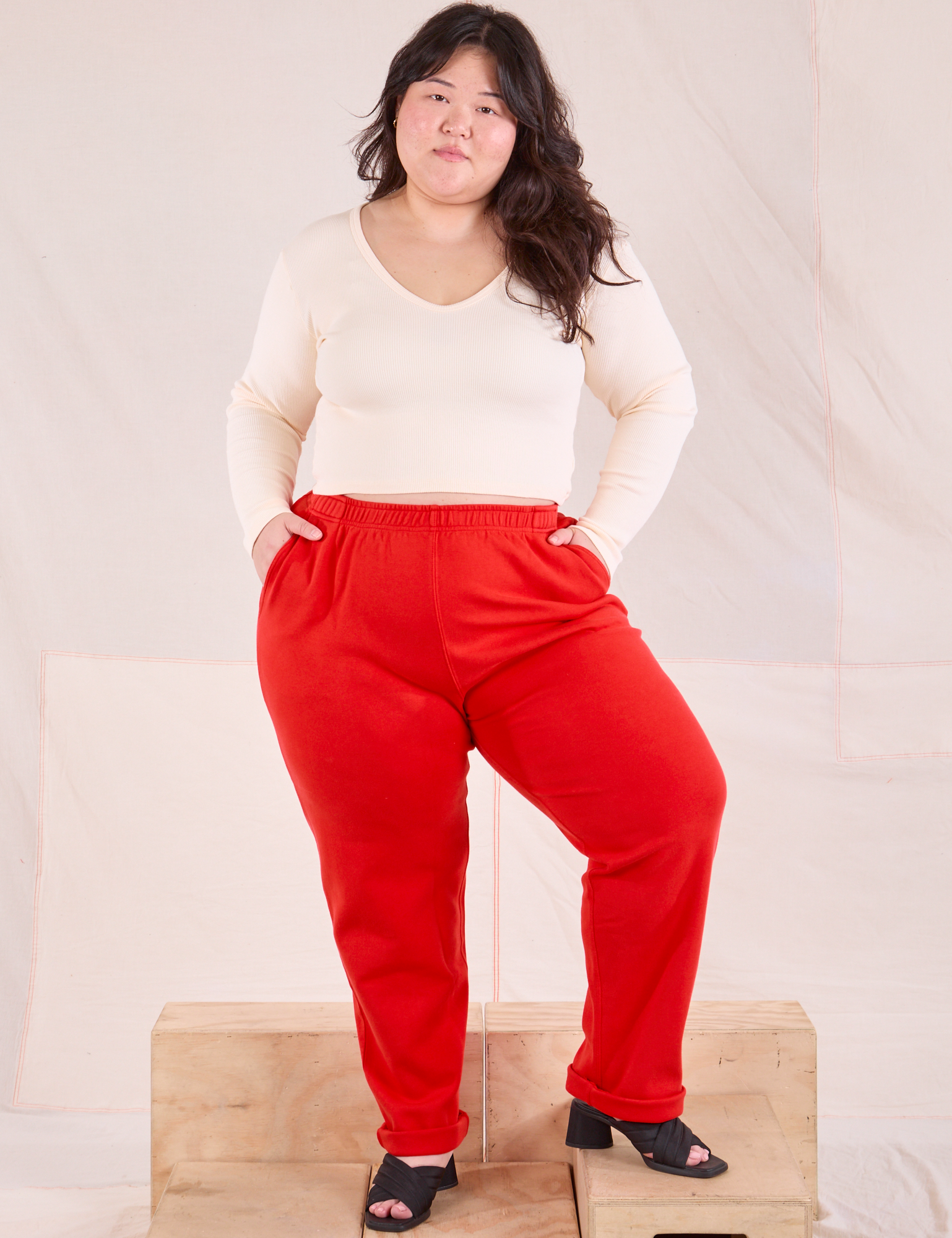 Ashley is 5&#39;7&quot; and wearing 0XL Easy Pants in Mustang Red paired with a vintage tee off-white Wrap Top