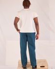 Back view of Easy Pants in Lagoon and Organic Vintage Tee in vintage tee off-white