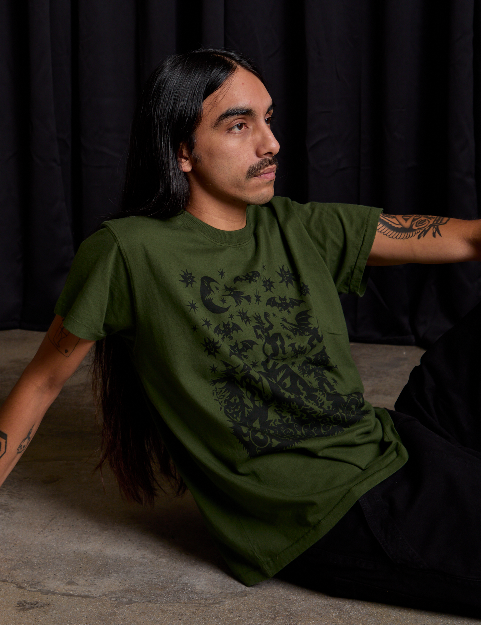 Anthony is wearing Vintage Tee in Papercut