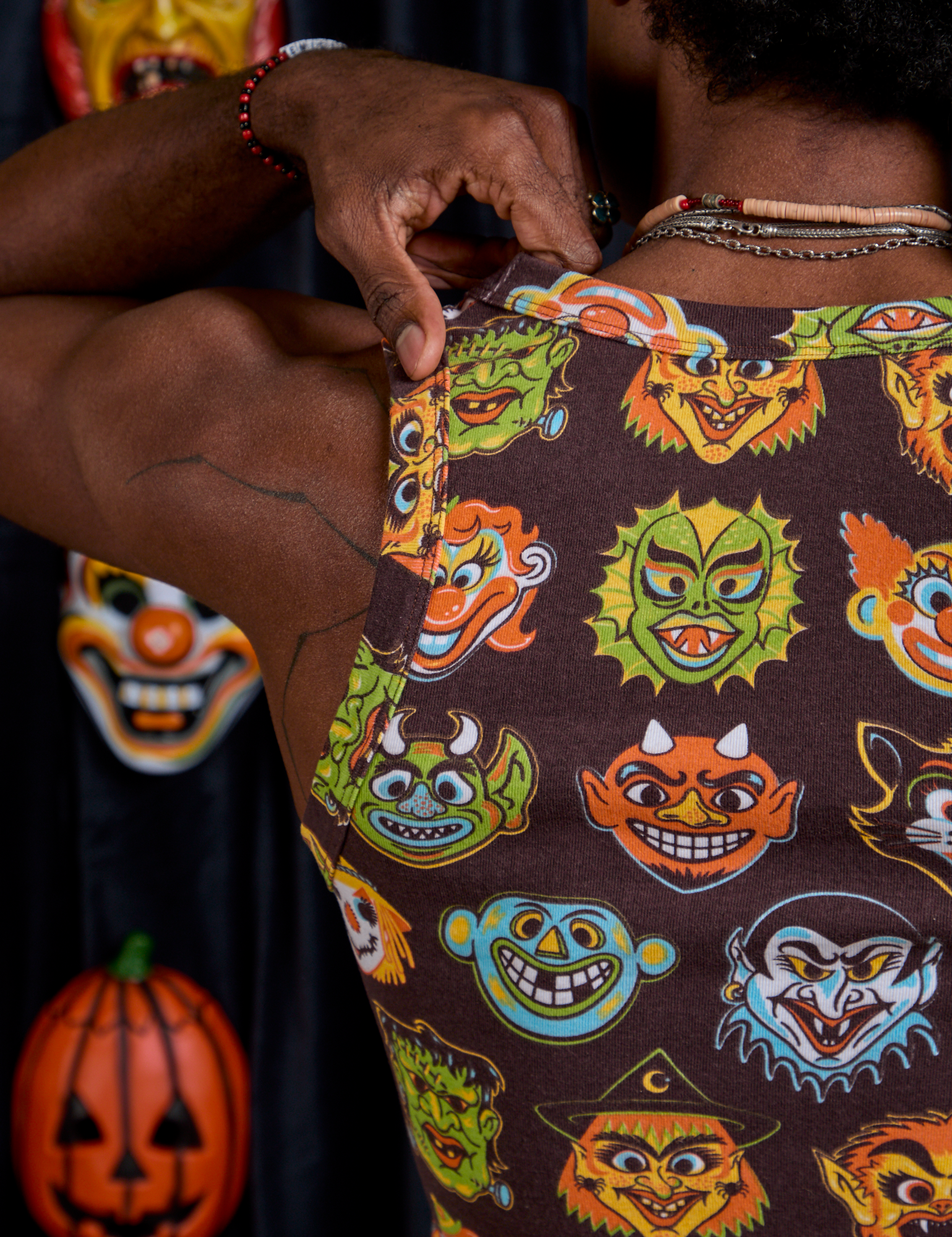 Cropped Tank Top in Halloween Masks back shoulder close up on Jerrod