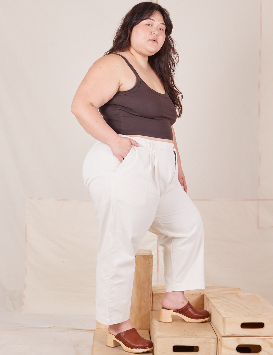 Side view of Heavyweight Trousers in Vintage Off-White and espresso brown Cropped Cami worn by Ashley