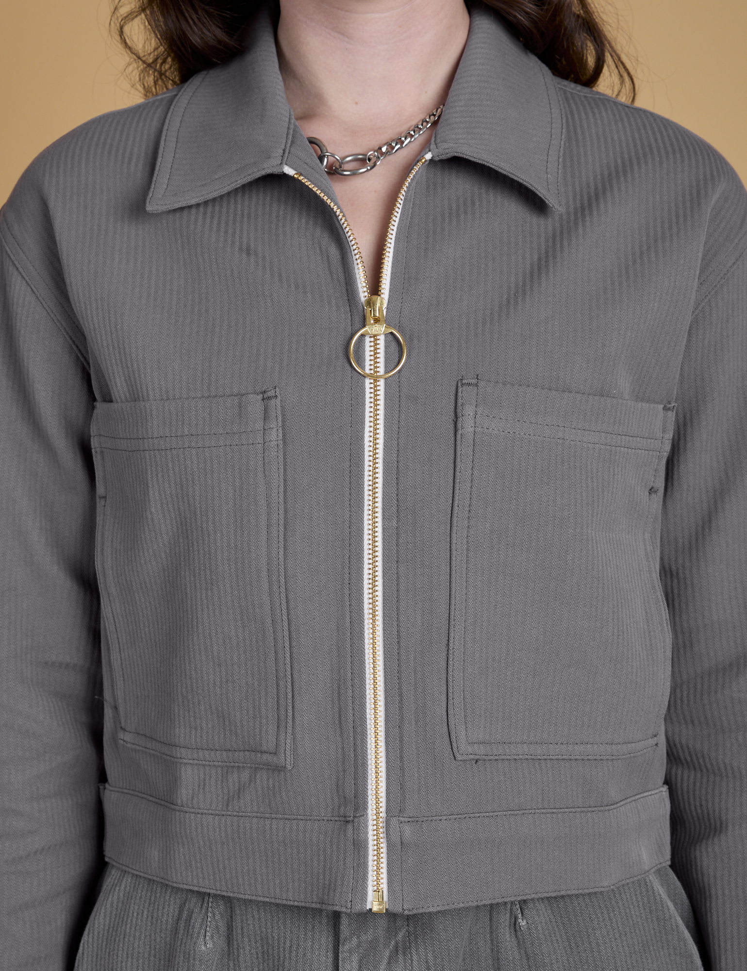 Front close up of Heritage Mechanic Jacket in Washed Grey on Alex