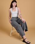 Alex is wearing Heritage Wide Leg Trousers in Washed Grey and Cropped Tank in Vintage Tee White