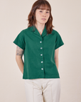 Hana is wearing size P Pantry Button-Up in Hunter Green