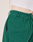 Back close up of elastic waistband of Heavyweight Trousers in Hunter Green on Hana