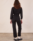 Long Sleeve Jumpsuit in Basic Black back view on Alex