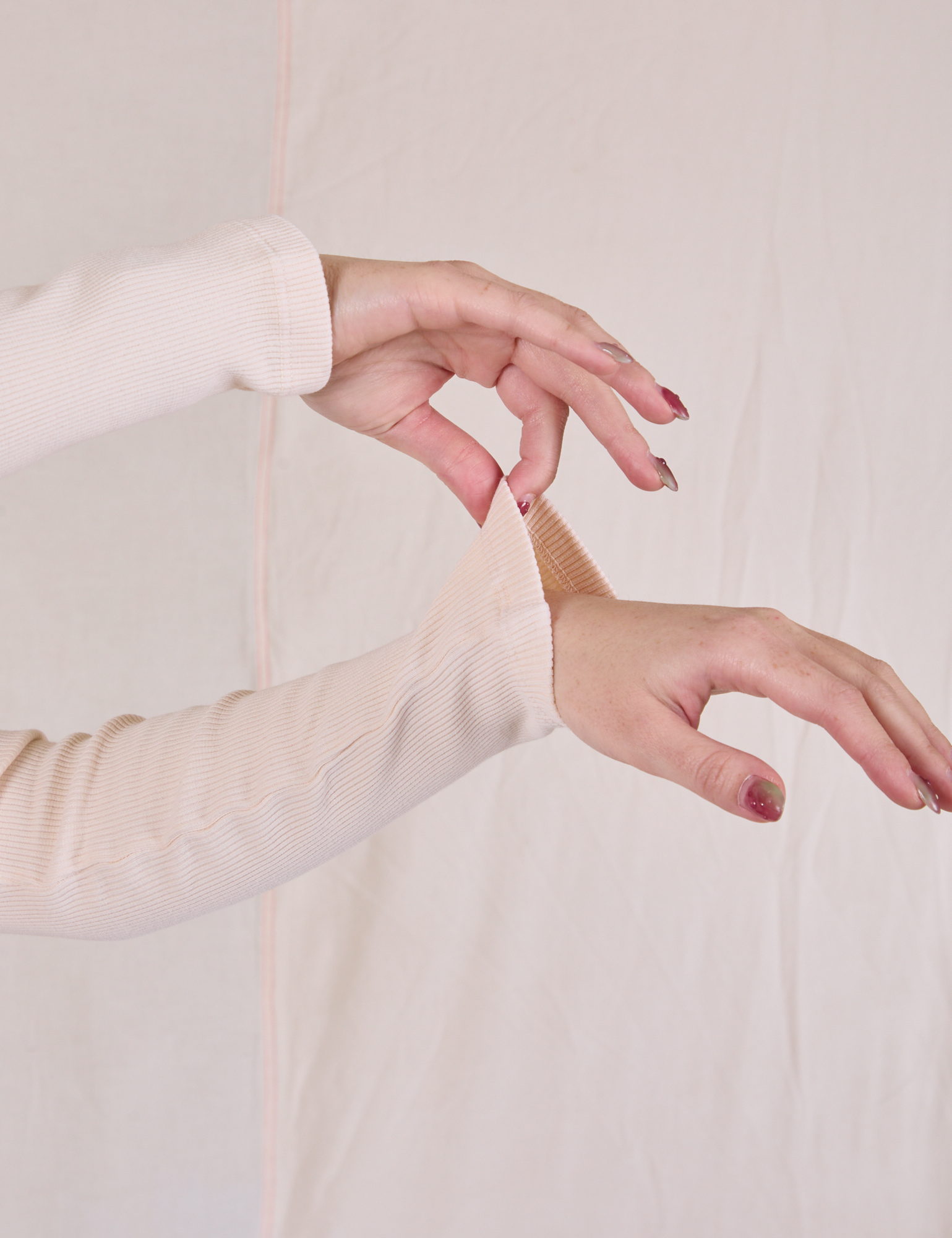 Long Sleeve V-Neck Tee in Vintage Tee Off-White sleeve close up on Hana