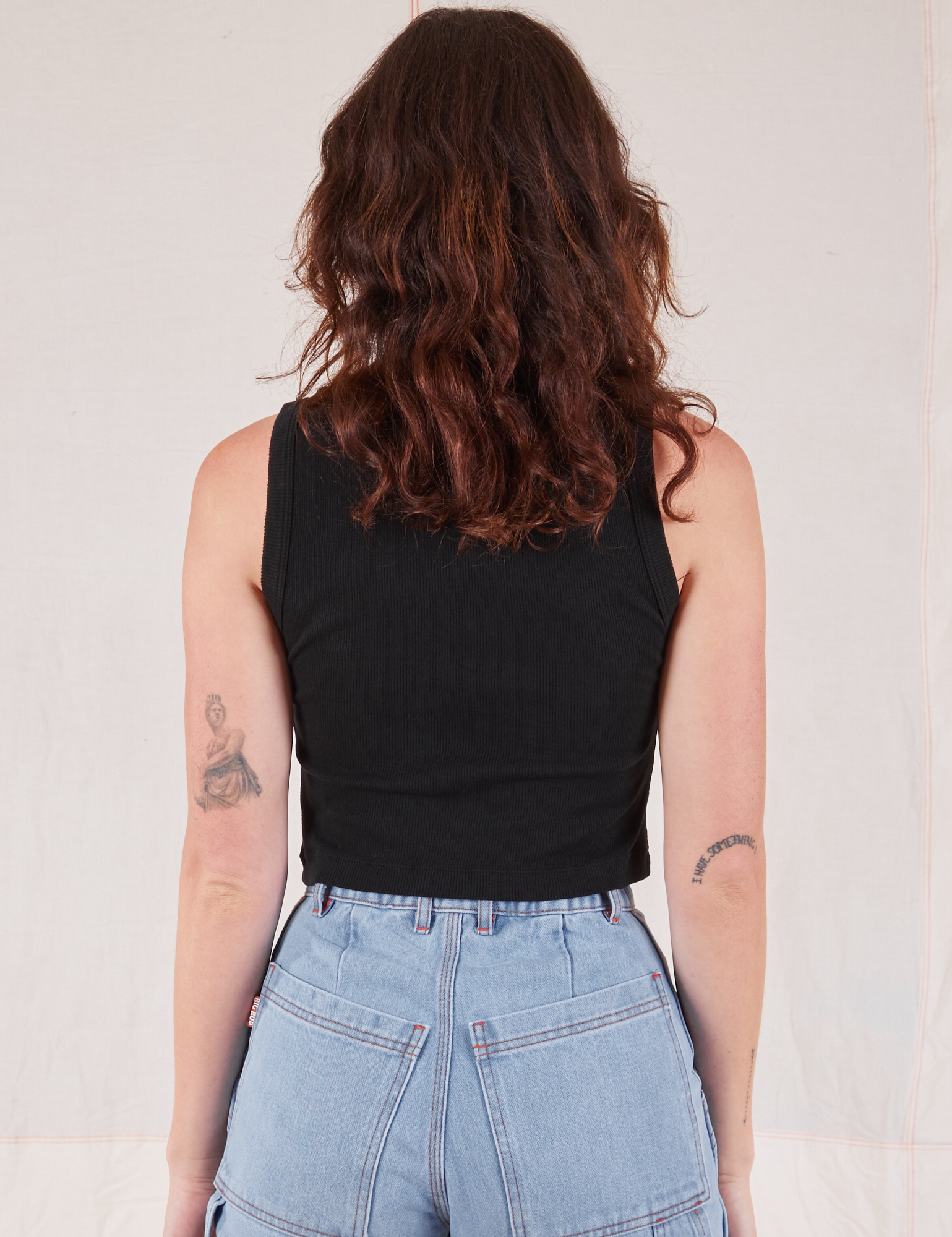 Muscle Tee in Basic Black back view on Alex