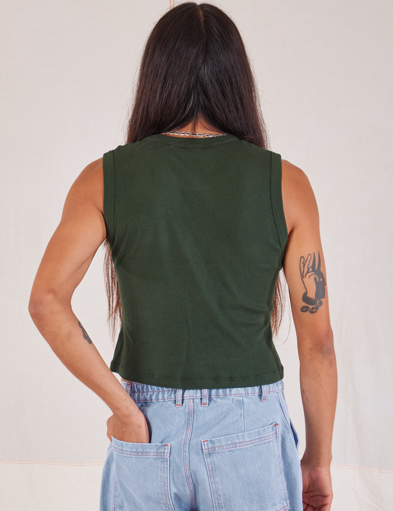 Muscle Tee in Swamp Green back view on Anthony