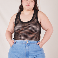 Ashley is 5'7" and wearing L Mesh Tank Top in Basic Black