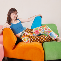 Hana is wearing Mismatched Print Work Pants and marine blue Cropped Cami