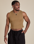 Isaac is 5’10” and wearing S Muscle Tee in Desert Brown