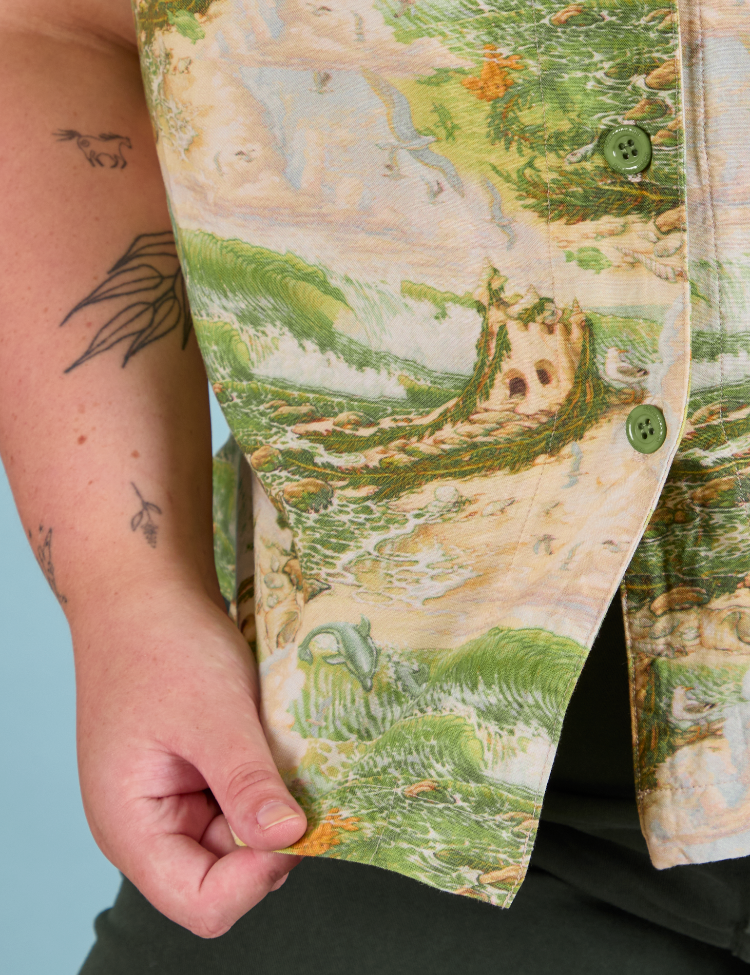 Pantry Button-Up in Ocean and Sky bottom hem close up on Juliet